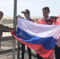 На одной из самых высоких дюн Куршской косы подняли флаг в честь Дня России (фото) - Klops.Ru